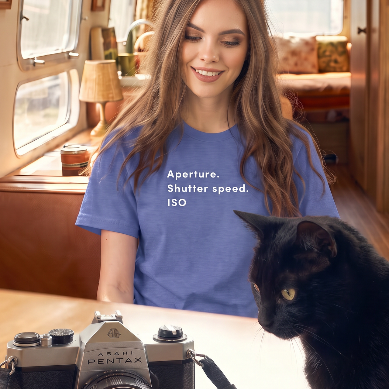 Aperture Retro-Inspired Graphic Tee retro graphic t-shirt on woman with cat and camera inside an airstream — Galactic Ink Club

