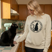 Cat Day retro-inspired black cat graphic sweatshirt in lifestyle setting — Galactic Ink Club