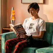 Keep Hope retro-inspired graphic tee light edition worn by person in mid-century modern setting — Galactic Ink Club
