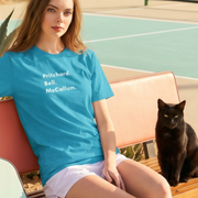 Pritchard Bell McCallum Retro Pickleball Tee on female model with black cat near pickleball court — Galactic Ink Club
