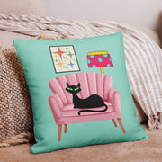 Retro black cat pink sofa throw pillow in mid-century modern room setting — Galactic Ink Club