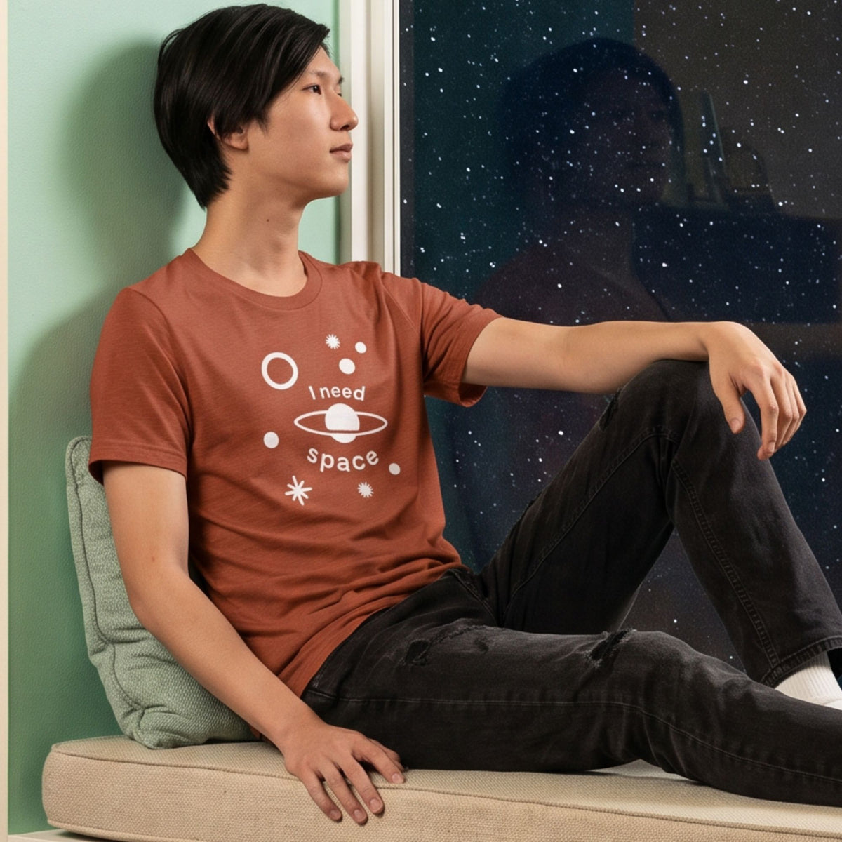 Scattered Stars Retro-Inspired Graphic Tee retro graphic t-shirt on man sitting looking out into the night — Galactic Ink Club

