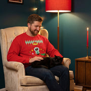 Space cat holiday retro-inspired graphic sweatshirt in lifestyle setting — Galactic Ink Club