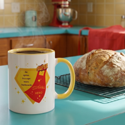 Super Kitchen Hero retro graphic mug on teal countertop with KitchenAid mixer and fresh bread — Galactic Ink Club