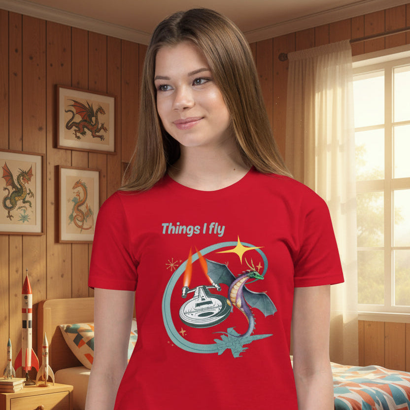 Things I Fly Retro-Inspired Graphic Tee Youth on a girl in a room with dragon pictures — Galactic Ink Club

